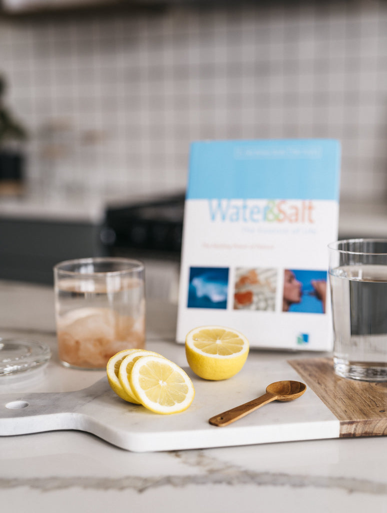 Water & Salt: the Essence of Life" by Dr. Hendel and Peter Ferreira with Sole and lemon water right view